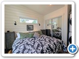 Primary Bedroom with laundry area